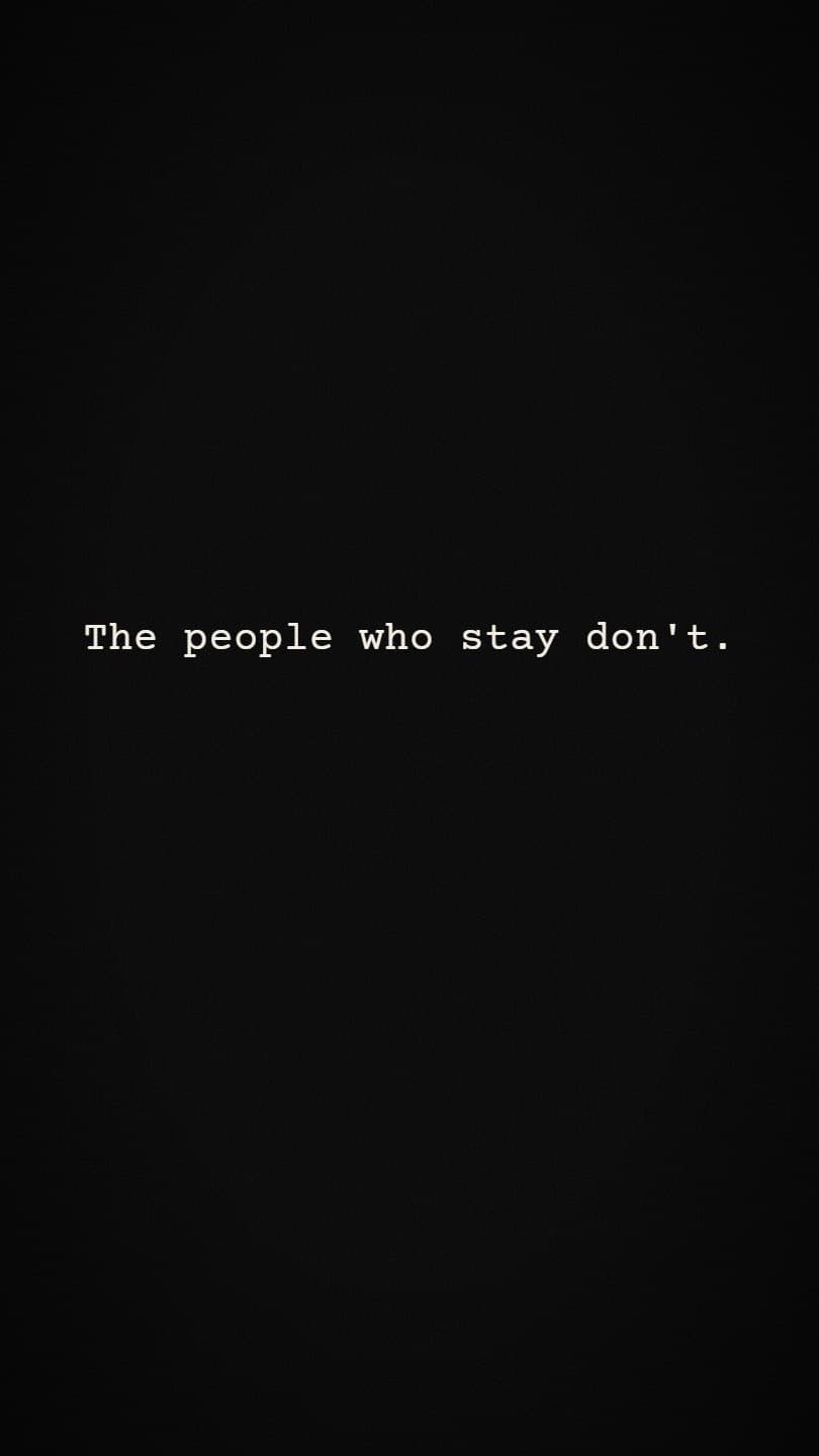 A black page with the line The people who stay don't typed in a typewriter font