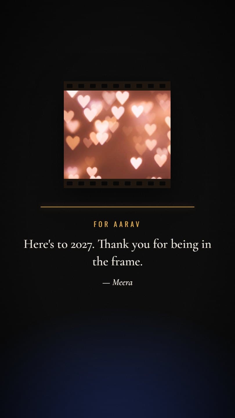 A colour photo in a small film frame above a gold line, the words For Aarav and a wish that reads Here's to 2027, thank you for being in the frame